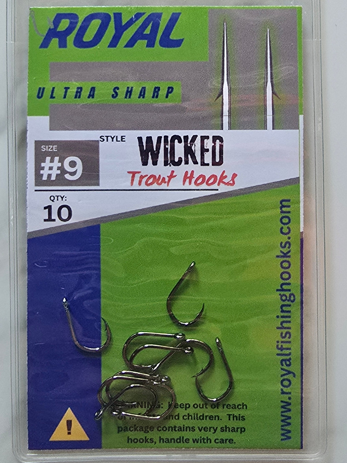 A package of 10 Royal Wicked Trout Hooks, size #9, in a clear plastic clamshell container with a green, white, and blue label, placed on a white marble surface.